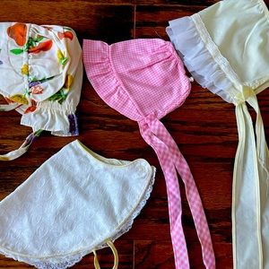 Vintage infant girls bonnets.